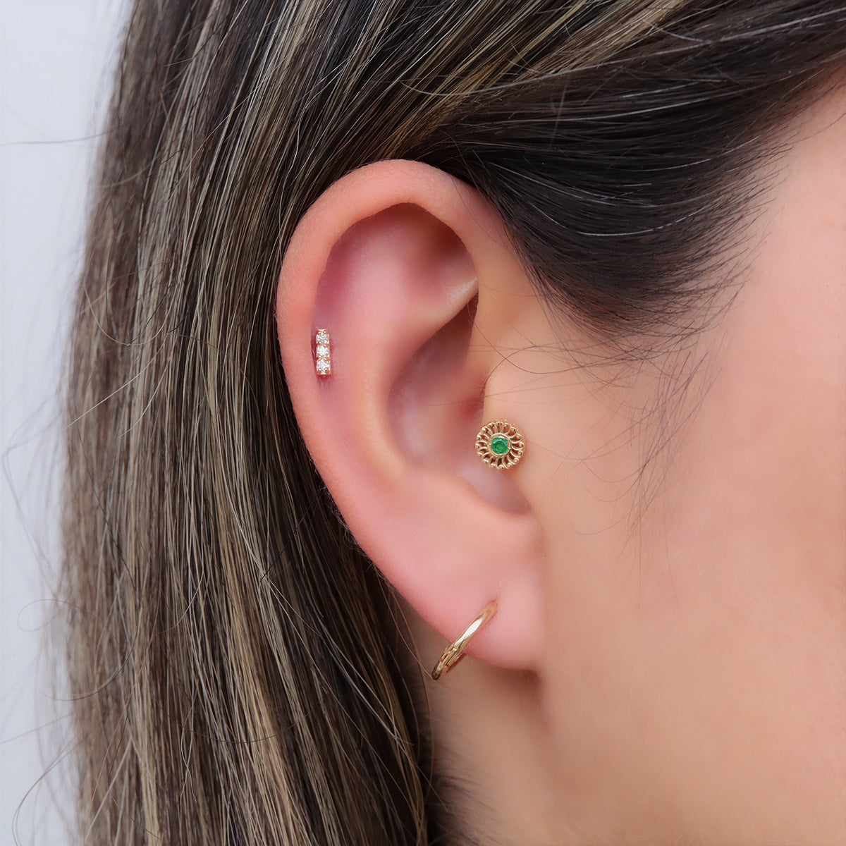 Labret Espiral en Oro 18K con Esmeralda Colombiana